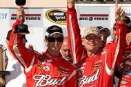 SONOMA, CA - JUNE 21: Kasey Kahne, driver of the #9 Budweiser Dodge, celebrates in victory lane with his crew chief Kenny Francis after winning the NASCAR Sprint Cup Series Toyota/Save Mart 350 at the Infineon Raceway on June 21, 2009 in Sonoma, California.  (Photo by Ezra Shaw/Getty Images for NASCAR)