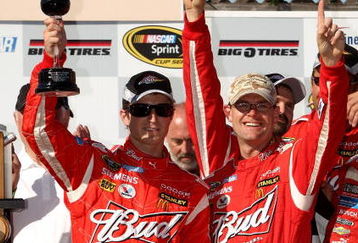 SONOMA, CA - JUNE 21: Kasey Kahne, driver of the #9 Budweiser Dodge, celebrates in victory lane with his crew chief Kenny Francis after winning the NASCAR Sprint Cup Series Toyota/Save Mart 350 at the Infineon Raceway on June 21, 2009 in Sonoma, California.  (Photo by Ezra Shaw/Getty Images for NASCAR)