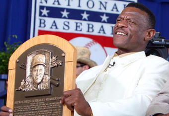 COOPERSTOWN, NY - JULY 26:  2009 inductee Rickey Henderson holds his plaque after his induction into the Baseball Hall of Fame at Clark Sports Center during the Baseball Hall of Fame induction ceremony on July 26, 2009 in Cooperstown, New York. Henderson is the all-time leader in stolen bases (1,406) and runs (2,295), a ten time All-Star, was the 1990 American League most valuable player and won two World Series titles.  (Photo by Jim McIsaac/Getty Images)