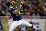 ST. LOUIS, MO - DECEMBER 21: Keenan Burton #14 of the St. Louis Rams hauls in a touchdown pass against the San Francisco 49ers at the Edward Jones Dome on December 21, 2008 in St. Louis, Missouri.  (Photo by Dilip Vishwanat/Getty Images)