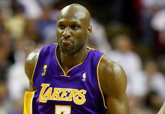 ORLANDO, FL - JUNE 14:  Lamar Odom #7 of the Los Angeles Lakers reacts in the third quarter against the Orlando Magic in Game Five of the 2009 NBA Finals on June 14, 2009 at Amway Arena in Orlando, Florida.  NOTE TO USER:  User expressly acknowledges and agrees that, by downloading and or using this photograph, User is consenting to the terms and conditions of the Getty Images License Agreement.  (Photo by Ronald Martinez/Getty Images)