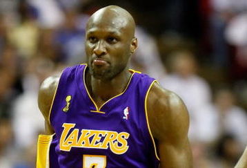 ORLANDO, FL - JUNE 14:  Lamar Odom #7 of the Los Angeles Lakers reacts in the third quarter against the Orlando Magic in Game Five of the 2009 NBA Finals on June 14, 2009 at Amway Arena in Orlando, Florida.  NOTE TO USER:  User expressly acknowledges and agrees that, by downloading and or using this photograph, User is consenting to the terms and conditions of the Getty Images License Agreement.  (Photo by Ronald Martinez/Getty Images)