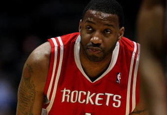 MILWAUKEE - FEBRUARY 09: Tracy McGrady #1 of the Houston Rockets watches as a teammate shoots a free-throw against the Milwaukee Bucks on February 9, 2009 at the Bradley Center in Milwaukee, Wisconsin. The Bucks defeated the Rockets 124-112. NOTE TO USER: User expressly acknowledges and agreees that, by downloading and/or using this Photograph, User is consenting to the terms and conditions of the Getty Images License Agreement. (Photo by Jonathan Daniel/Getty Images)