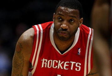 MILWAUKEE - FEBRUARY 09: Tracy McGrady #1 of the Houston Rockets watches as a teammate shoots a free-throw against the Milwaukee Bucks on February 9, 2009 at the Bradley Center in Milwaukee, Wisconsin. The Bucks defeated the Rockets 124-112. NOTE TO USER: User expressly acknowledges and agreees that, by downloading and/or using this Photograph, User is consenting to the terms and conditions of the Getty Images License Agreement. (Photo by Jonathan Daniel/Getty Images)