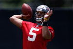 TAMPA, FL - MAY 01:  Quarterback Josh Freeman #5 of the Tampa Bay Buccaneers throws a pass during the Buccaneers Rookie Minicamp at One Buccaneer Place on May 1, 2009 in Tampa, Florida.  (Photo by J. Meric/Getty Images)
