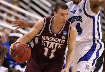 NORTH LITTLE ROCK, AR - MARCH 23:  Ben Hansbrough #11 of the Mississippi State Bulldogs drives on Chris Douglas-Roberts #14 of the Memphis Tigers during the second round of the South Regional as part of the 2008 NCAA Men's Basketball Tournament at Alltel Arena on March 23, 2008 in North Little Rock, Arkansas.  (Photo by Andy Lyons/Getty Images)