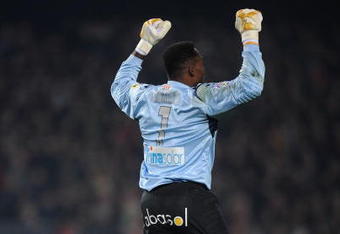 BARCELONA, SPAIN - FEBRUARY 21:  Carlos Kameni of Espanyol celebrates after his team scored their second goal during the La Liga match between Barcelona and Espanyol at the Camp Nou stadium on February 21, 2009 in Barcelona, Spain.  (Photo by Denis Doyle/Getty Images)