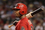 PHOENIX - JULY 26:  Justin Upton #10 of the Arizona Diamondbacks waits to bat during the major league baseball game against the Pittsburgh Pirates at Chase Field on July 26, 2009 in Phoenix, Arizona. The Diamondbacks defeated the Pirates 9-0.  (Photo by Christian Petersen/Getty Images)