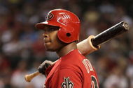 PHOENIX - JULY 26:  Justin Upton #10 of the Arizona Diamondbacks waits to bat during the major league baseball game against the Pittsburgh Pirates at Chase Field on July 26, 2009 in Phoenix, Arizona. The Diamondbacks defeated the Pirates 9-0.  (Photo by Christian Petersen/Getty Images)