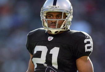 OAKLAND, CA - DECEMBER 17: Nnamdi Asomugha #21 of the Oakland Raiders jogs on the field during an NFL game against the St. Louis Rams at McAfee Coliseum December 17, 2006 in Oakland, California. (Photo by Jed Jacobsohn/Getty Images)