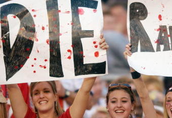 SAN DIEGO - JANUARY 26:  Three female fans of the Tampa Bay Buccaneers show their hate for the Oakland Raiders during Super Bowl XXXVII on January 26, 2003 at Qualcomm Stadium in San Diego, California. The Buccaneers defeated the Raiders 48-21. (Photo by Doug Pensinger/Getty Images)