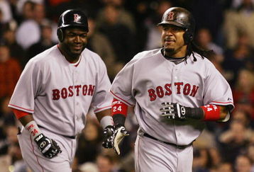 NEW YORK - APRIL 16: Manny Ramirez #24 and David Ortiz #34 of the Boston Red Sox celebrate after scoring against the New York Yankees on April 16, 2008 at Yankee Stadium in the Bronx borough of New York City. The Yankees won the game 15-9. (Photo by Jim McIsaac/Getty Images) 