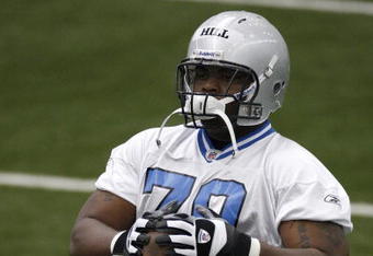 ALLEN PARK, MI - MAY 01: Sammie Lee Hill #79 of the Detroit Lions stretches during rookie orientation camp at the Detroit Lions Headquarters and Training Facility on May 1, 2009 in Allen Park, Michigan.  (Photo by Gregory Shamus/Getty Images)