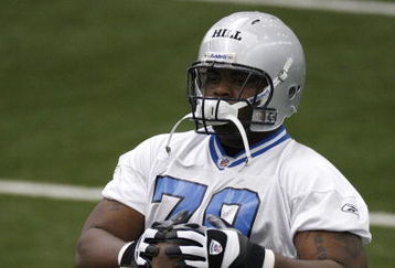ALLEN PARK, MI - MAY 01: Sammie Lee Hill #79 of the Detroit Lions stretches during rookie orientation camp at the Detroit Lions Headquarters and Training Facility on May 1, 2009 in Allen Park, Michigan.  (Photo by Gregory Shamus/Getty Images)