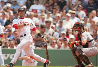 BOSTON - JULY 22:  Nomar Garciaparra #5 of the Boston Red Sox bats during the game against the Baltimore Orioles on July 22, 2004 at Fenway Park in Boston, Massachusetts.  The Orioles won 8-3. (Photo by Ezra Shaw/Getty Images)