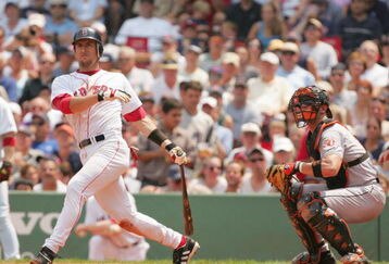 BOSTON - JULY 22:  Nomar Garciaparra #5 of the Boston Red Sox bats during the game against the Baltimore Orioles on July 22, 2004 at Fenway Park in Boston, Massachusetts.  The Orioles won 8-3. (Photo by Ezra Shaw/Getty Images)