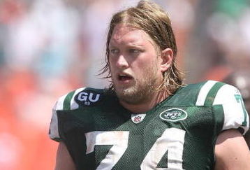 MIAMI - SEPTEMBER 07:  Center Nick Mangold #74 of the New York Jets looks on against the Miami Dolphins at Dolphin Stadium on September 7, 2008 in Miami, Florida. The Jets won 20-14.  (Photo by Doug Benc/Getty Images)