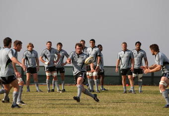 DURBAN, SOUTH AFRICA - JULY 30:  Andrew Hore passes the ball during the New Zealand All Blacks training session held at Crawford School on July 30, 2009 in Durban, South Africa.  (Photo by David Rogers/Getty Images)