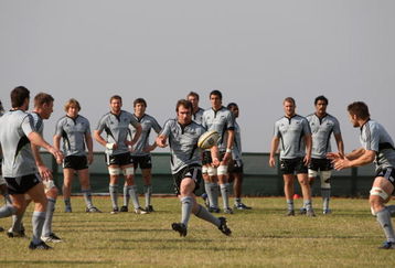 DURBAN, SOUTH AFRICA - JULY 30:  Andrew Hore passes the ball during the New Zealand All Blacks training session held at Crawford School on July 30, 2009 in Durban, South Africa.  (Photo by David Rogers/Getty Images)
