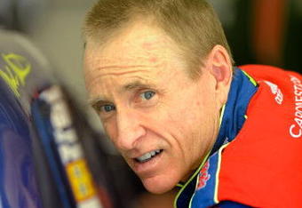 INDIANAPOLIS - JULY 25:  Mark Martin, driver of the #5 CARQUEST/Kellogg's Chevrolet, gets into his car before practice for the NASCAR Sprint Cup Series Allstate 400 at the Brickyard at Indianapolis Motor Speedway on July 25, 2009 in Indianapolis, Indiana.  (Photo by John Harrelson/Getty Images for NASCAR)