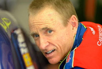 INDIANAPOLIS - JULY 25:  Mark Martin, driver of the #5 CARQUEST/Kellogg's Chevrolet, gets into his car before practice for the NASCAR Sprint Cup Series Allstate 400 at the Brickyard at Indianapolis Motor Speedway on July 25, 2009 in Indianapolis, Indiana.  (Photo by John Harrelson/Getty Images for NASCAR)