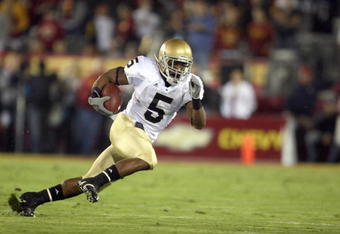 LOS ANGELES - NOVEMBER 29:  Armando Allen Jr. #5 of the Notre Dame Fighting Irish carries the ball during the game against the USC Trojans at the Memorial Coliseum on November 29, 2008 in Los Angeles, California. (Photo by: Jeff Gross/Getty Images)