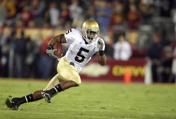 LOS ANGELES - NOVEMBER 29:  Armando Allen Jr. #5 of the Notre Dame Fighting Irish carries the ball during the game against the USC Trojans at the Memorial Coliseum on November 29, 2008 in Los Angeles, California. (Photo by: Jeff Gross/Getty Images)