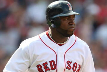 BOSTON - JULY 30:  Designated hitter David Ortiz #34 of the Boston Red Sox hits a three-run home run against the Oakland A's in the seventh inning to give the Red Sox a 6-5 lead on July 30, 2009 at Fenway Park in Boston, Massachusetts.  (Photo by Elsa/Getty Images)