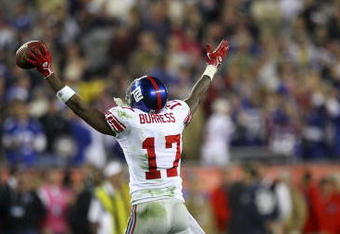 GLENDALE, AZ - FEBRUARY 03:  Wide receiver Plaxico Burress #17 of the New York Giants celebrates after catching a 13-yard touchdown pass in the fourth quarter against the New England Patriots during Super Bowl XLII on February 3, 2008 at the University of Phoenix Stadium in Glendale, Arizona.  The Giants defeated the Patriots 17-14. (Photo by Donald Miralle/Getty Images)