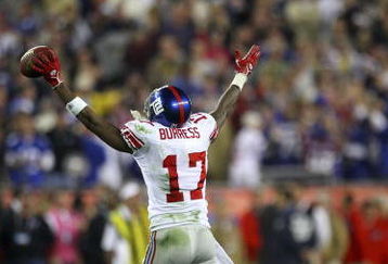 GLENDALE, AZ - FEBRUARY 03:  Wide receiver Plaxico Burress #17 of the New York Giants celebrates after catching a 13-yard touchdown pass in the fourth quarter against the New England Patriots during Super Bowl XLII on February 3, 2008 at the University of Phoenix Stadium in Glendale, Arizona.  The Giants defeated the Patriots 17-14. (Photo by Donald Miralle/Getty Images)