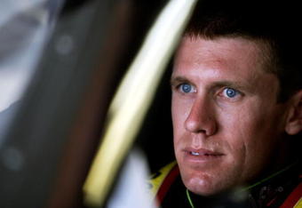 INDIANAPOLIS - JULY 24:  Carl Edwards, driver of the #99 Aflac Ford, prepares to practice for the NASCAR Sprint Cup Series Allstate 400 at the Brickyard at Indianapolis Motor Speedway on July 24, 2009 in Indianapolis, Indiana.  (Photo by Jamie Squire/Getty Images)