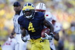 ANN ARBOR, MI - SEPTEMBER 27:  Brandon Minor #4 of the Michigan Wolverines carries the ball during the game against the Wisconsin Badgers on September 27, 2008 at Michigan Stadium in Ann Arbor, Michigan. (Photo by Gregory Shamus/Getty Images) 