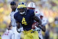ANN ARBOR, MI - SEPTEMBER 27: Brandon Minor #4 of the Michigan Wolverines carries the ball during the game against the Wisconsin Badgers on September 27, 2008 at Michigan Stadium in Ann Arbor, Michigan. (Photo by Gregory Shamus/Getty Images)