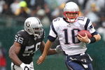 OAKLAND, CA - DECEMBER 14:  Matt Cassel #16 of the New England Patriots scrambles with the ball as Derrick Burgess #56 of the Oakland Raiders defends during an NFL game on December 14, 2008 at the Oakland-Alameda County Coliseum in Oakland, California.  (Photo by Jed Jacobsohn/Getty Images)