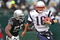 OAKLAND, CA - DECEMBER 14:  Matt Cassel #16 of the New England Patriots scrambles with the ball as Derrick Burgess #56 of the Oakland Raiders defends during an NFL game on December 14, 2008 at the Oakland-Alameda County Coliseum in Oakland, California.  (Photo by Jed Jacobsohn/Getty Images)
