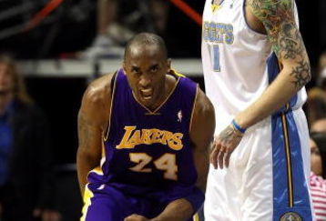 DENVER - MAY 29:  Kobe Bryant #24 of the Los Angeles Lakers reacts next to Chris Andersen #11 of the Denver Nuggets after Bryant makes a shot in the second quarter of Game Six of the Western Conference Finals during the 2009 NBA Playoffs at Pepsi Center on May 29, 2009 in Denver, Colorado. NOTE TO USER: User expressly acknowledges and agrees that, by downloading and or using this photograph, User is consenting to the terms and conditions of the Getty Images License Agreement.  (Photo by Jed Jacobsohn/Getty Images)