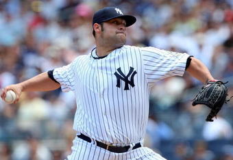 NEW YORK - JULY 19:  Joba Chamberlain #62 of the New York Yankees pitches against the Detroit Tigers on July 19, 2009 at Yankee Stadium in the Bronx borough of New York City.  (Photo by Jim McIsaac/Getty Images)