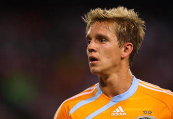 EAST RUTHERFORD, NJ - MAY 16:  Stuart Holden #22 of the Houston Dynamo looks on against the New York Red Bulls at Giants Stadium in the Meadowlands on May 16, 2009 in East Rutherford, New Jersey. Houston and New York play to a 1-1 Tie.  (Photo by Mike Stobe/Getty Images for New York Red Bull)