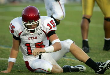 PASADENA, CA - SEPTEMBER 02:  Quarterback Brett Ratliff #15 of the Utah Utes stands up after being knocked down against the UCLA Bruins during the college football game held on Septemeber 2, 2006 at the Rose Bowl in Pasadena, California.  The Bruins defeated the Utes 31-10. The Bruins defeated the Utes 31-10.  (Photo by Stephen Dunn/Getty Images)