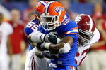 ATLANTA - DECEMBER 06:  Terrence Cody #62 of the Alabama Crimson Tide tackles Jeffery Demps #2 of the Florida Gators during the SEC Championship on December 6, 2008 at the Georgia Dome in Atlanta, Georgia.  (Photo by Kevin C. Cox/Getty Images)