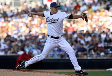 SAN DIEGO - APRIL 06:  Pitcher Jake Peavy #44 of the San Diego Padres throws a pitch against the Los Angeles Dodgers on April 6, 2009 at Petco Park in San Diego, California.  The Dodgers won 4-1.  (Photo by Stephen Dunn/Getty Images)