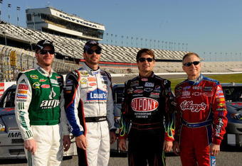 DAYTONA BEACH, FL - FEBRUARY 07:  Hendricks Motorsports drivers Dale Earnhardt Jr., Jimmie Johnson, Jeff Gordon, and Mark Martin pose for the media to honor Rick Hendrick prior to practice for the NASCAR Sprint Cup Series Daytona 500 at Daytona International Speedway on February 7, 2009 in Daytona Beach, Florida.  (Photo by Rusty Jarrett/Getty Images for NASCAR)