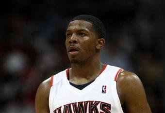 ATLANTA - APRIL 28: Guard Joe Johnson #2 of the Atlanta Hawks takes a breather in Game Four of the Eastern Conference Quarterfinals against the Boston Celtics during the 2008 NBA Playoffs at the Philips Arena on April 28, 2008 in Atlanta, Georgia. The Hawks beat the Celtics 97-92.  NOTE TO USER: User expressly acknowledges and agrees that, by downloading and or using this photograph, User is consenting to the terms and conditions of the Getty Images License Agreement. (Photo by Mike Zarrilli/Getty Images)