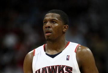 ATLANTA - APRIL 28: Guard Joe Johnson #2 of the Atlanta Hawks takes a breather in Game Four of the Eastern Conference Quarterfinals against the Boston Celtics during the 2008 NBA Playoffs at the Philips Arena on April 28, 2008 in Atlanta, Georgia. The Hawks beat the Celtics 97-92.  NOTE TO USER: User expressly acknowledges and agrees that, by downloading and or using this photograph, User is consenting to the terms and conditions of the Getty Images License Agreement. (Photo by Mike Zarrilli/Getty Images)