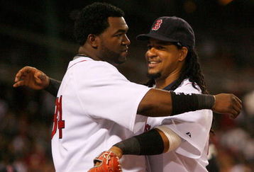 BOSTON - JULY 27: David Ortiz #34 and Manny Ramirez #24 of the Boston Red Sox embrace during a game with the New York Yankees at Fenway Park on July 27, 2008 in Boston, Massachusetts.  (Photo by Jim Rogash/Getty Images)