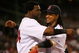 BOSTON - JULY 27: David Ortiz #34 and Manny Ramirez #24 of the Boston Red Sox embrace during a game with the New York Yankees at Fenway Park on July 27, 2008 in Boston, Massachusetts.  (Photo by Jim Rogash/Getty Images)