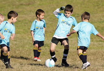 SYDNEY, AUSTRALIA - JULY 25:  Children play soccer as a part of the Optus Small Sided Football program announcment between Football Federation Australia (FFA) and Optus at Heffron Park on July 25, 2009 in Sydney, Australia.  (Photo by Mark Nolan/Getty Images)
