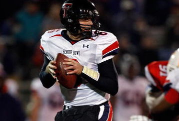 MOBILE, AL - JANUARY 24:  Graham Harrell #6 of North Team drops back against the South Team during the Under Armour Senior Bowl on January 24, 2009 at Ladd-Peebles Stadium in Mobile, Alabama.  (Photo by Chris Graythen/Getty Images for Under Armour)