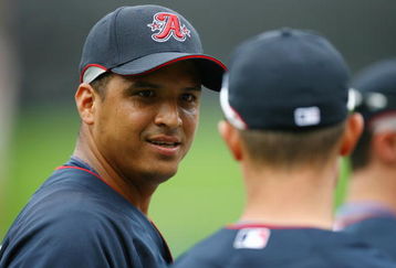ST. LOUIS, MO - JULY 14:   American League All-Star Victor Martinez of the Cleveland Indians talks with a teammate prior to the start of the 2009 MLB All-Star Game at Busch Stadium on July 14, 2009 in St Louis, Missouri. (Photo by: Jamie Squire/Getty Images)
