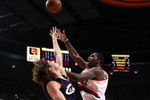 PORTLAND, OR - JANUARY 21:  Greg Oden #52 of the Portland Trail Blazers lays up the ball against Anderson Varejao #17 of the Cleveland Cavaliers at the Rose Garden on January 21, 2009 in Portland, Oregon.  NOTE TO USER: User expressly acknowledges and agrees that, by downloading and or using this Photograph, user is consenting to the terms and conditions of the Getty Images License Agreement.  (Photo by Jonathan Ferrey/Getty Images)